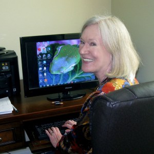 Author Claire Matturro at her computer