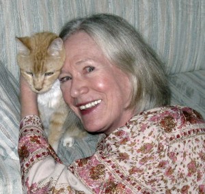 Author Claire Matturro and yellow tabby Victor